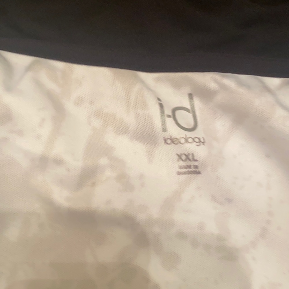 Black white designer paint jacket.